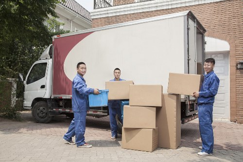 Man and van service loading boxes in Shoreditch street