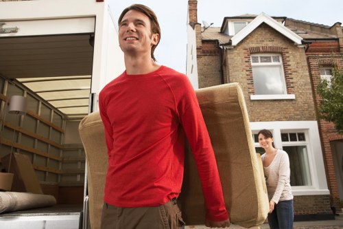 Boxes and furniture being loaded during Shoreditch removals